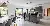 Bungalow mit 150qm - Offener Wohnbereich mit grauer Küche und Kochinsel - LUXHAUS Bungalow Walmdach 158