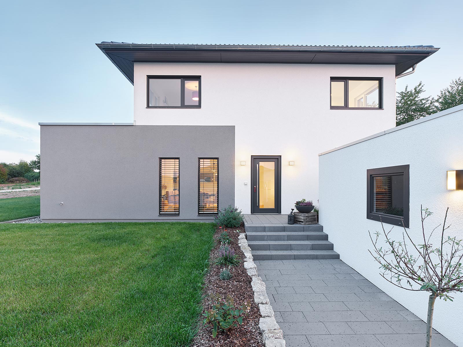 A modern villa with a pitched roof.